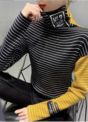 Жіночий гольф у смужку