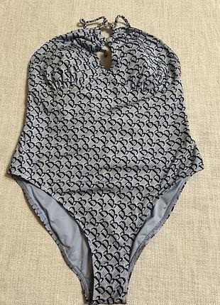 Суцільний голубий купальник на завʼязках