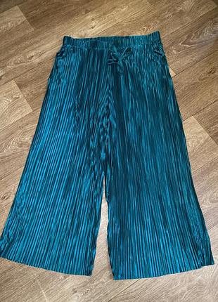 Продам бірюзові плісировані штани з кишеньками