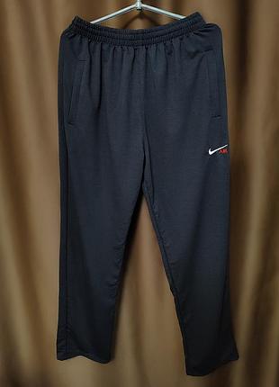 Мужские брюки спортивные nike.ткань двунитка.размер 50.производитель украинская.цвет черный.