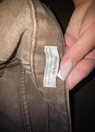 Джинси у коричневому кольорі