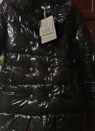 Подовжений пуховик.