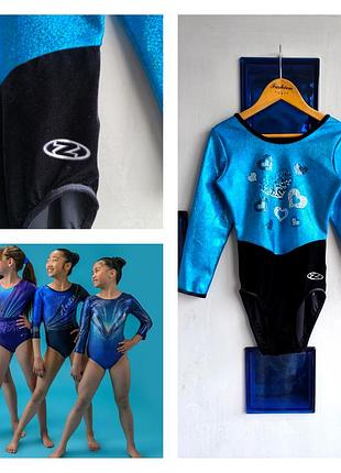 Фирменный купальник трико для танцев и гимнастики на 11-12 лет the zone