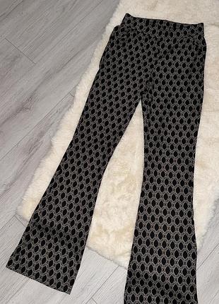 Штани кльош з принтом