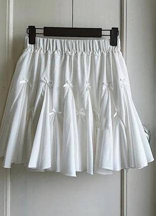 Трендова спідничка з бантиками