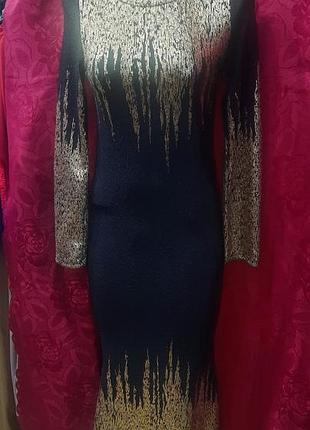 Нарядное длинное трикотажное платье