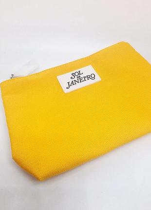 Яркая косметичка sol de janeiro