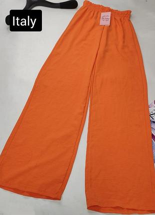 Брюки жіночі помаранчевого кольору прямі від бренду italy xs