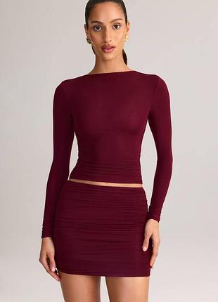 Міні-спідниця з модалу з рюшами та середньою посадкою винно-червоного кольору