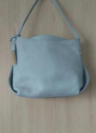 Кожаная сумочка от итальянских мастеров для женщин, которые ценят качество.