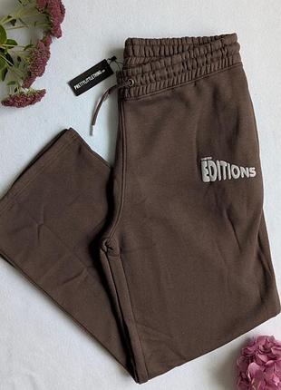 Трендові спортівні штани оверсайз широкого крою від prettylittlethings