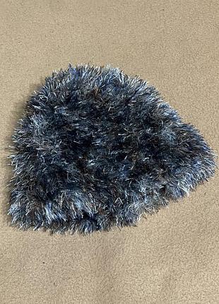 Жіноча пухнаста шапка