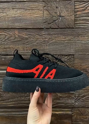 Текстильні кросівки