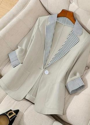 Жіночий жакет бежевого кольору – стильний та універсальний