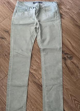 Джинсы мятные