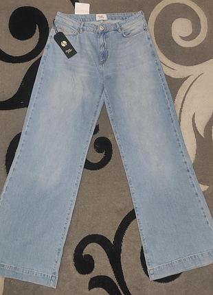 Джинсы женские