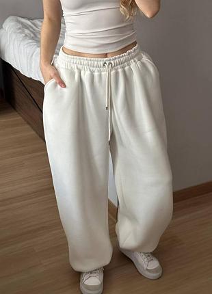 Женские широкие теплые брюки пенье на флисе парикие утепленные брюки брючины