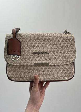 ❌ michael kors zippy bag cream