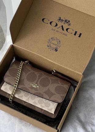 Сумка coach mini klare crossbody in signature canvas коричнево-молочная е.