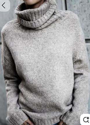 Светр в'язаний світло сірий з високим горлом