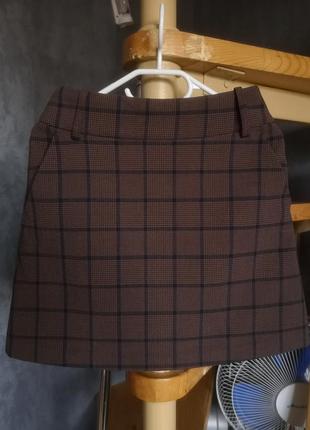 Коричнева мініюбка коротка юбка в клітинку з кишенями united colors of benetton