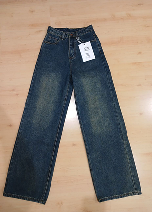 Женские джинсы прямого кроя с эффектом грязи и потертостями - туреченица