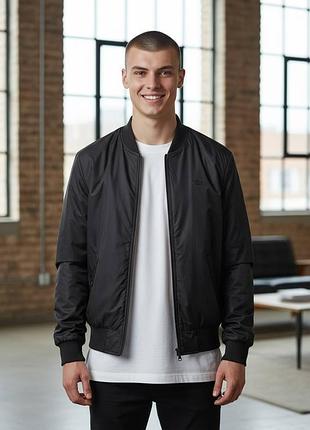 Двостороння куртка-бомбер lacoste