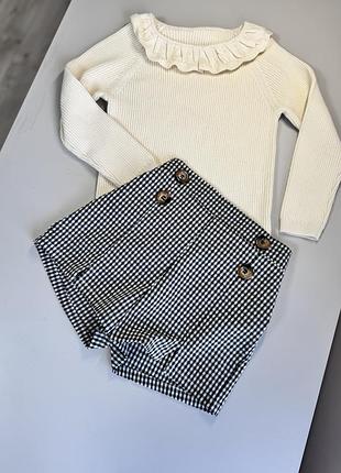 Класичні шорти з розпірками в клітинку чорну -білу