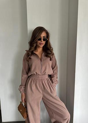 Теплі комбінезони