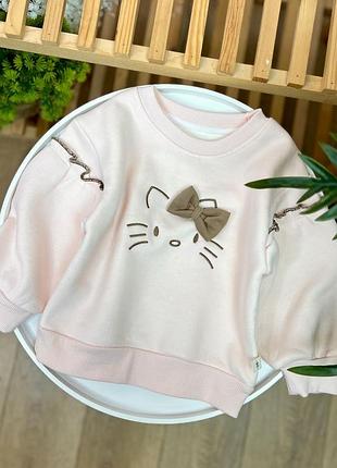 Тепла кофтинка