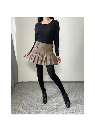 Міні спідниця в клітинку в складку кльош