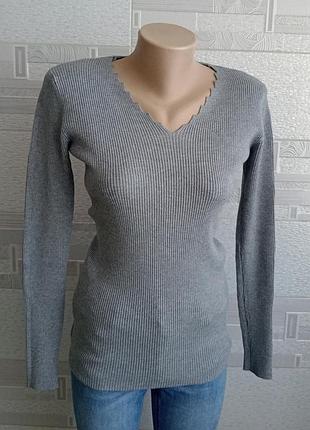 Подовжений джемпер в рубчик