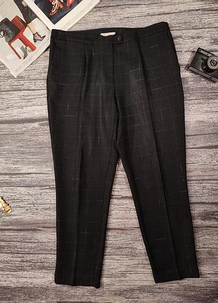 Жіночі брюки у клітинку