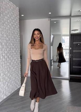 Нарядна шерстяна спідниця-міді вільного крою, трендова спадаюча юбка з шерсті