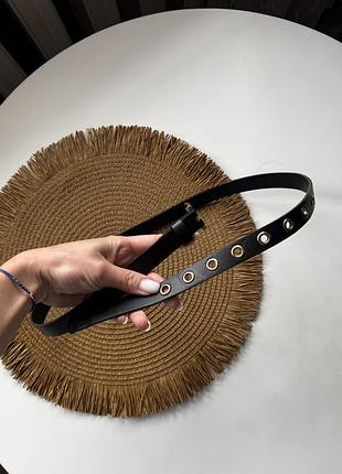 Ремінь з металевими отворами