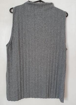 Женская жилетка