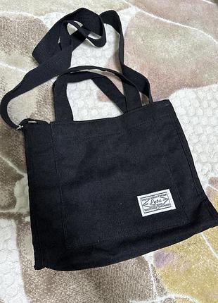 Чорна вельветова сумка на ручках і довгим ремінцем