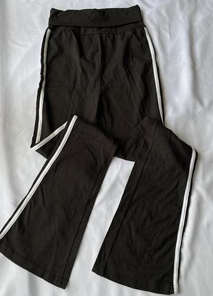 Штани кльош, лосіни з полосами білими кльош