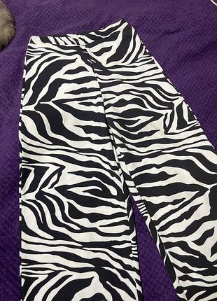 Штани палаццо з принтом зебри