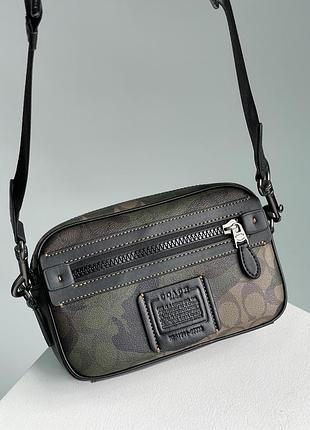 Сумка coach academy crossbody signature canvas camo