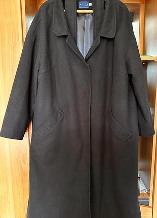 Жіноче пальто великого розміру