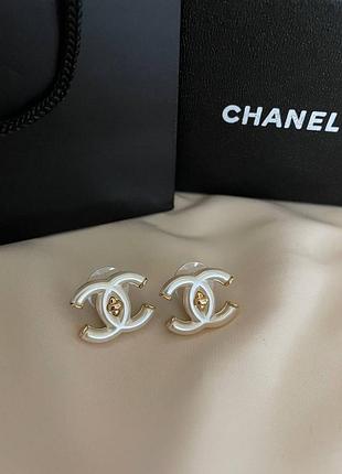 Брендові сережки цвяшки