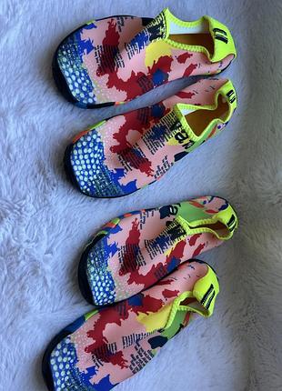 Аквашузи нові 37 р.) є дві пари,нові,уст 23 см,ціна за 1 шт.