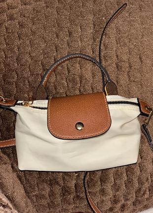 Маленька сумка longchamp бежева