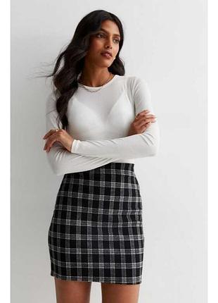 Спідниця new look у клітинку трикотажна тягнеться без підкладки s-m