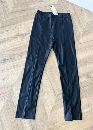 Чорні легінси зі штучної шкіри