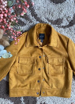 Коротка курточка жіноча