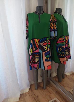 Яскрава з кишенями туніка