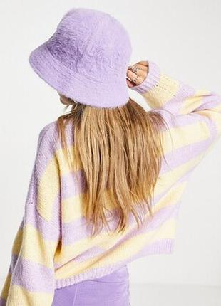 Стильна брендова тепла хутряна панама ніжно лавандового кольору.