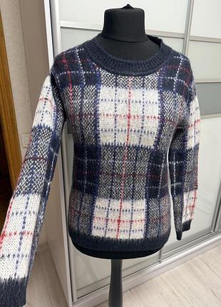 Мохеровий светрик в клітинку